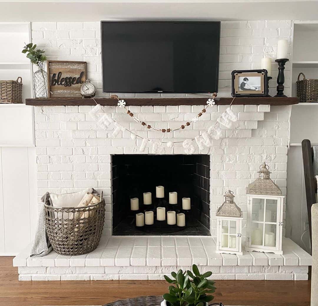 Grouped White Lanterns Add Cozy Ambiance to Hearth