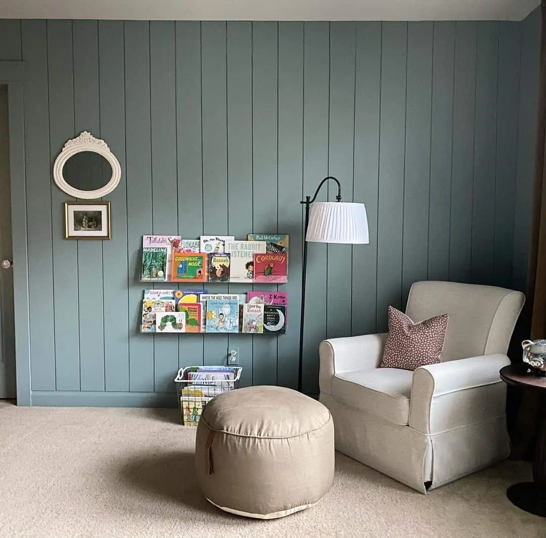 Vertical Green Paneling Creates a Cozy Reading Nook