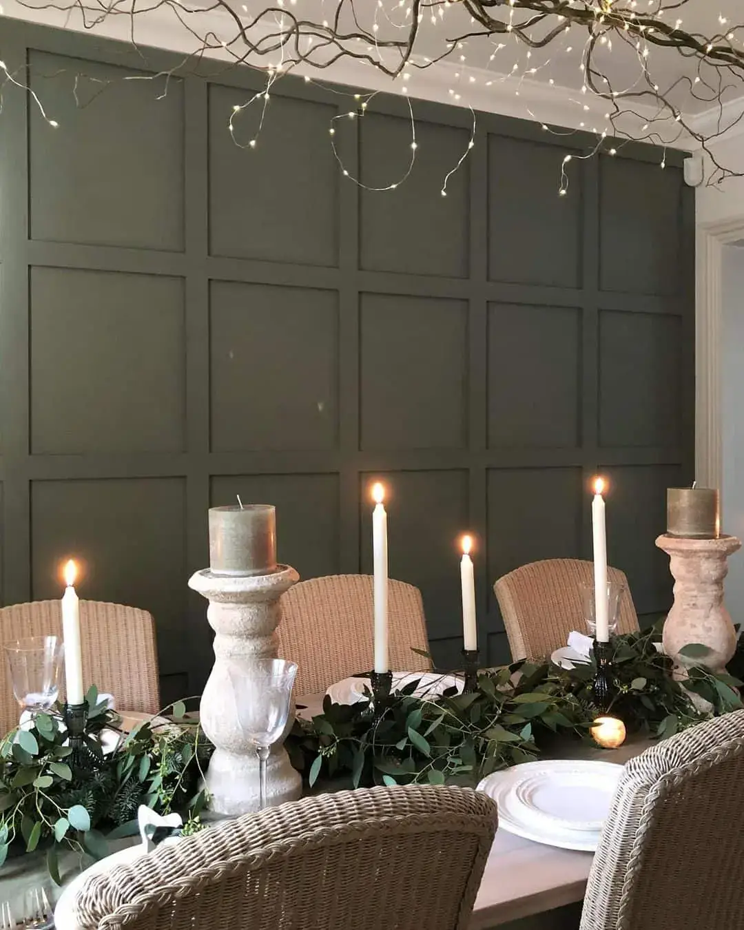 Paneled Green Walls with Twinkling Branch Decor
