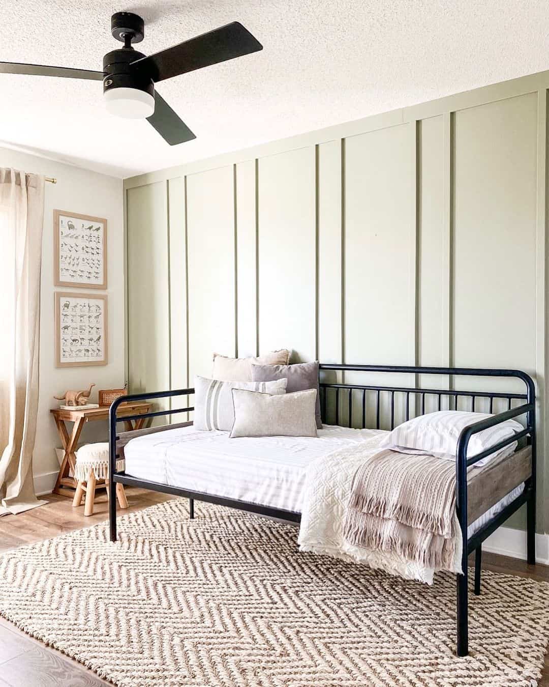 Pale Green Vertical Paneling Creates a Serene Nursery