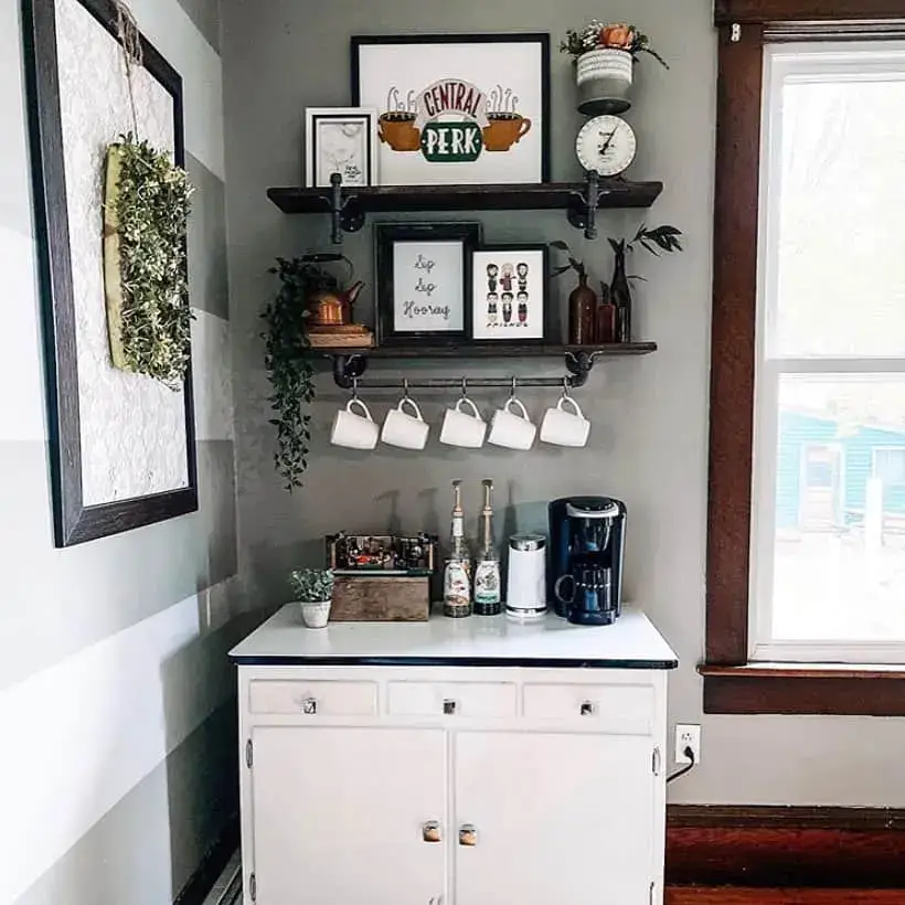 Two-Tiered Pipe Shelving Holds Themed Art and Coffee Essentials