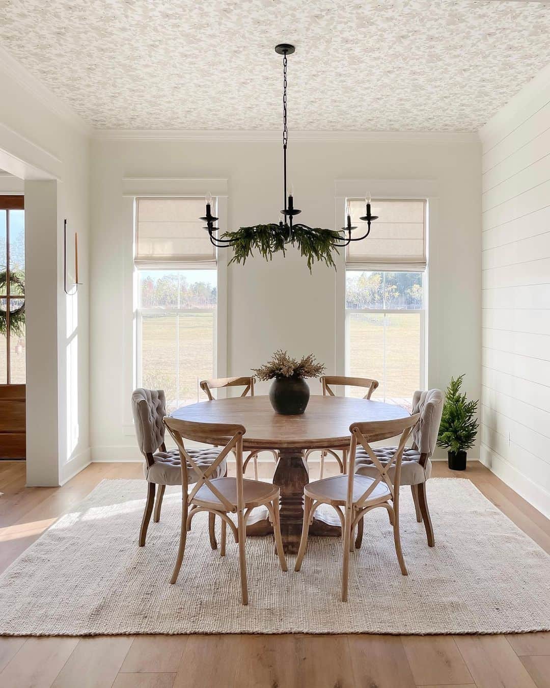 Adorn Your Chandelier with Evergreen Garland