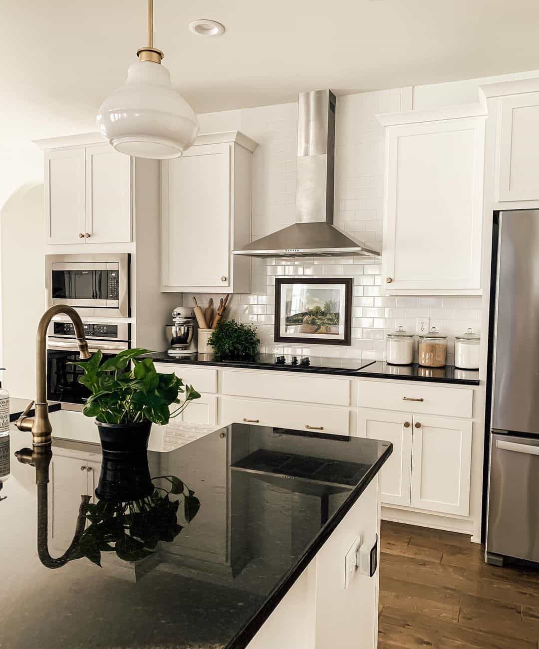 Framed Landscape Art Above the Stove