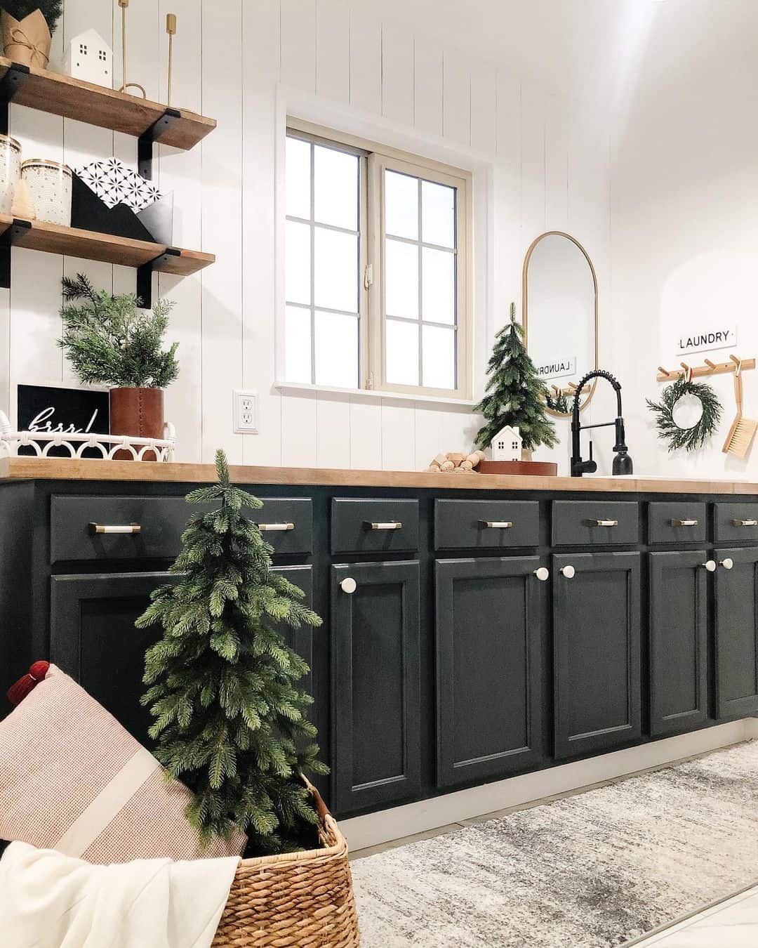 Dark Cabinetry Creates a Sleek Base for a Wood Countertop