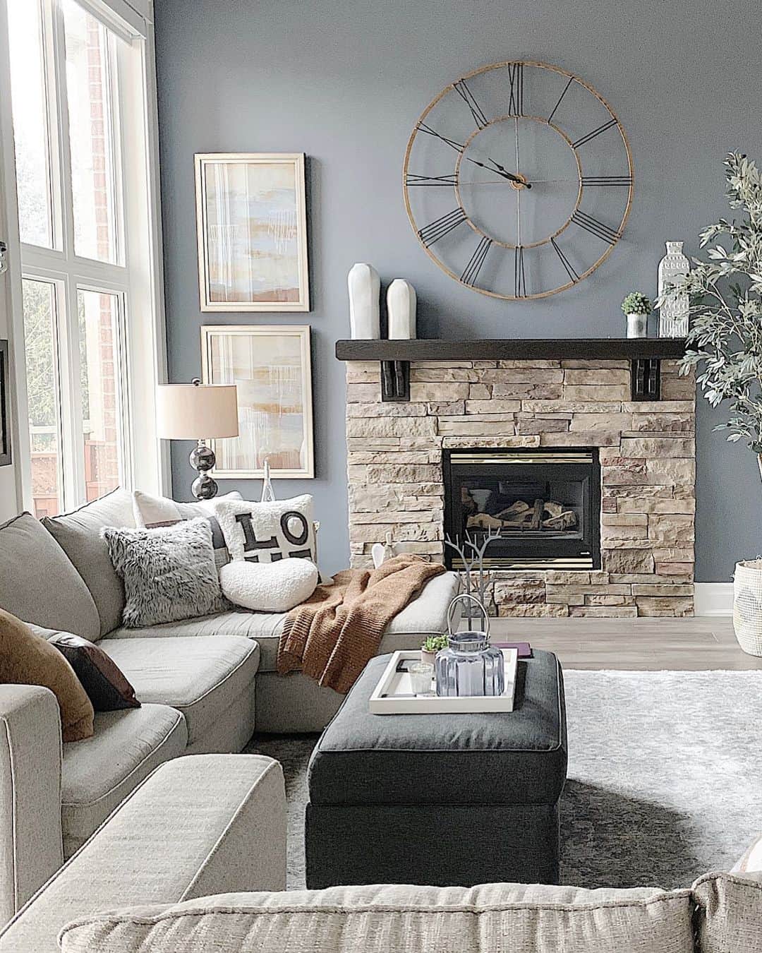 Oversized Wall Clock Anchors Stone Fireplace