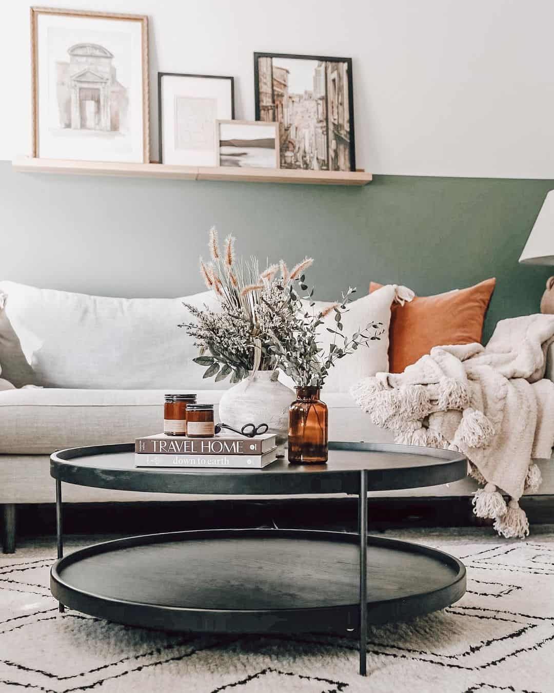 Layered coffee table with books and amber vase
