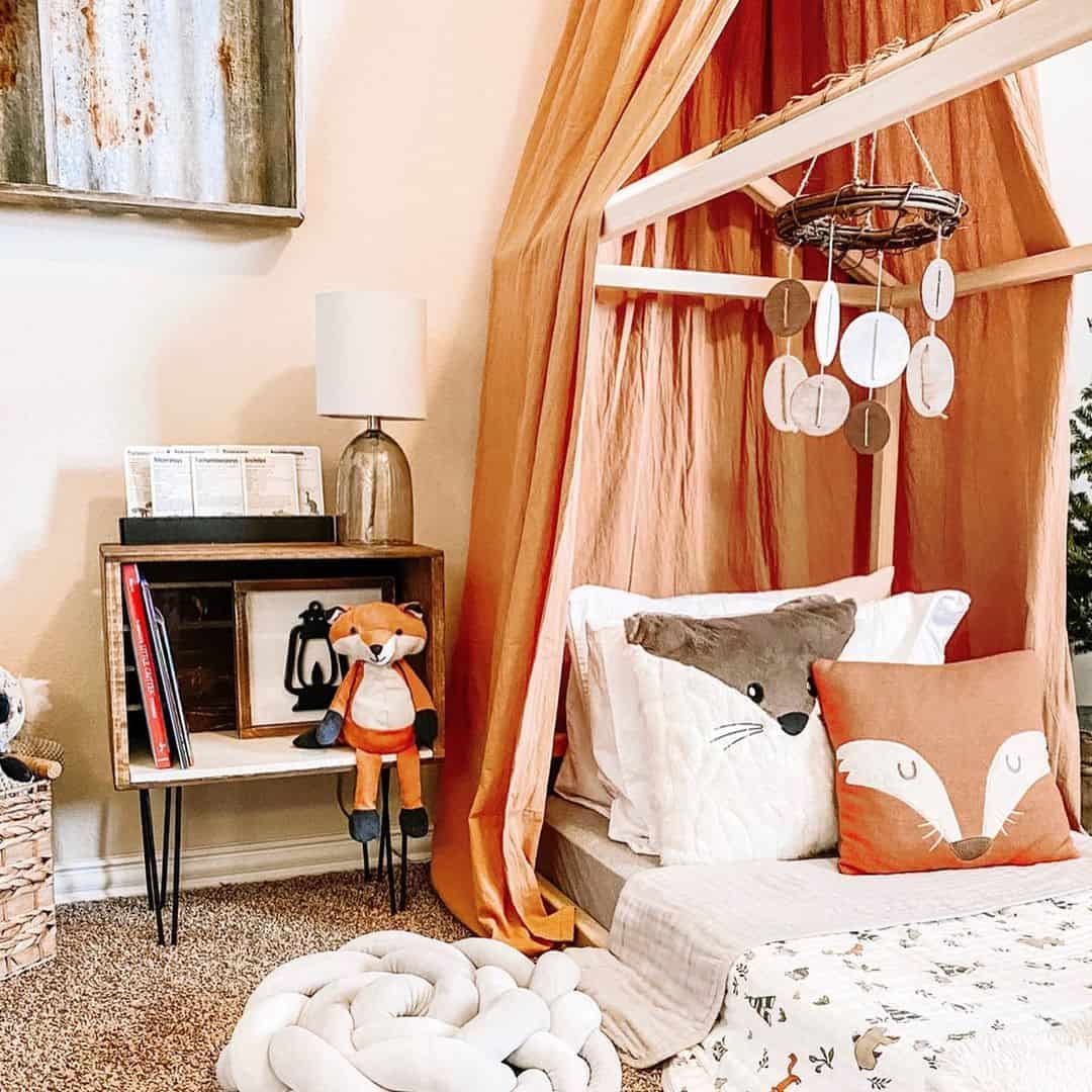 Orange Canopy Drapes Create a Cozy, Whimsical Bed Nook