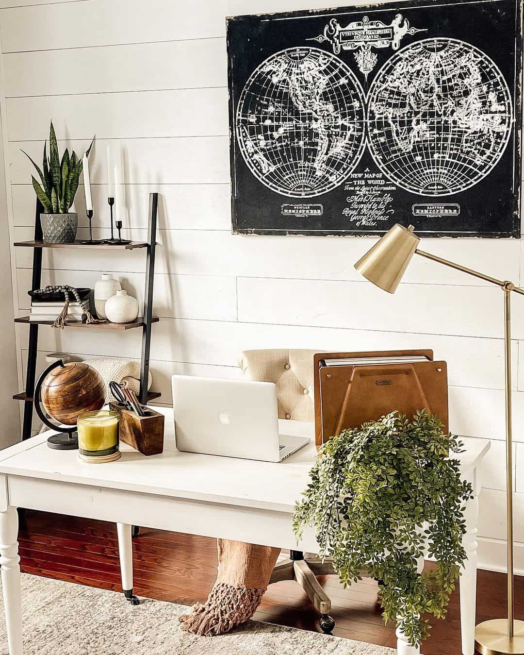 Large World Map Artwork Sets an Adventurous Tone Above Desk