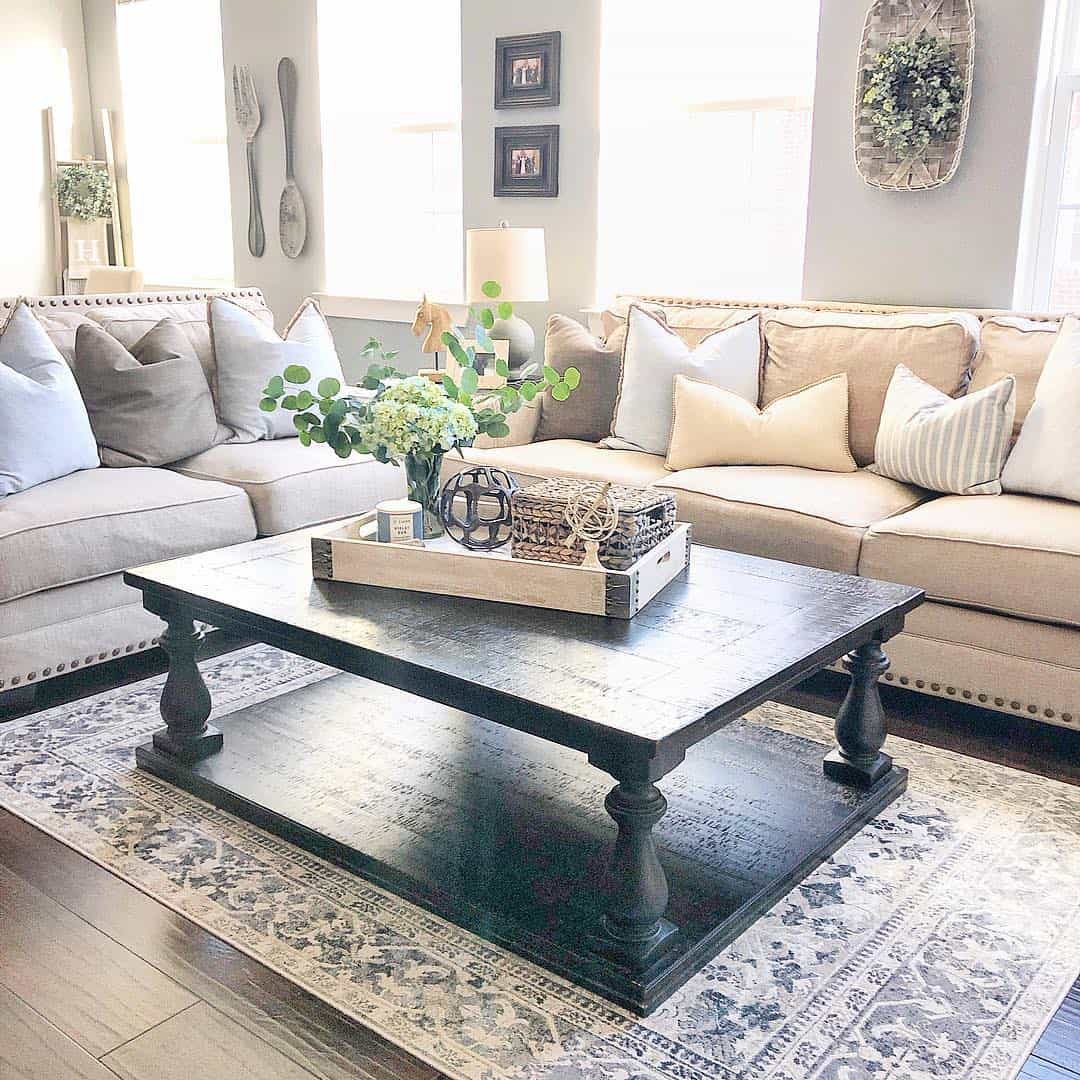 Anchor a Patterned Rug With a Dark Farmhouse Coffee Table