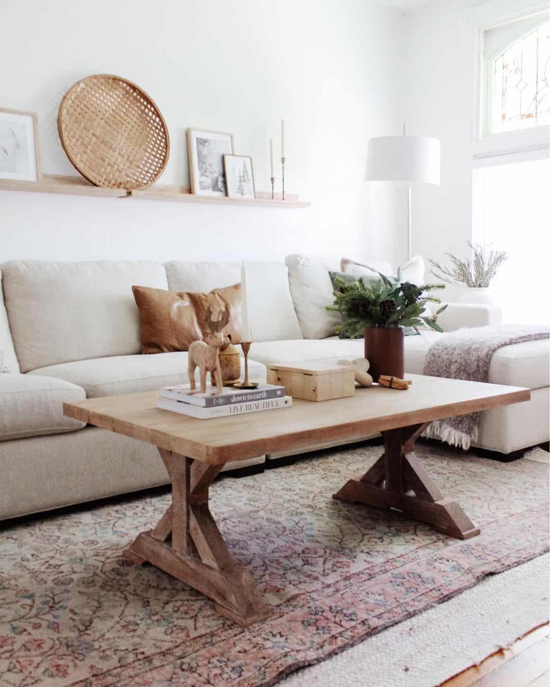 Anchor a Patterned Rug With a Trestle Base Wood Coffee Table