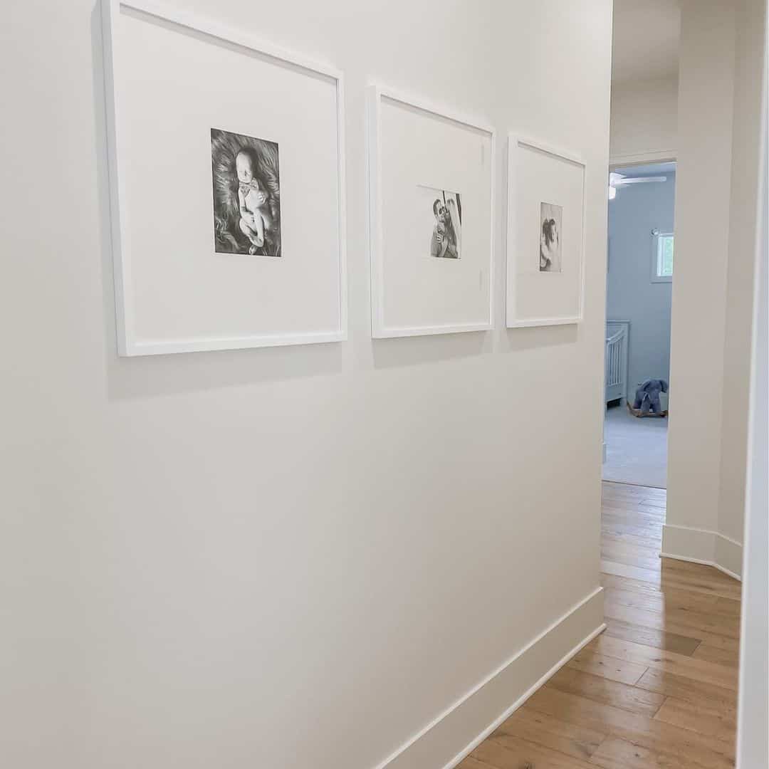 Gentle Hallway Flow with Three Black and White Portraits