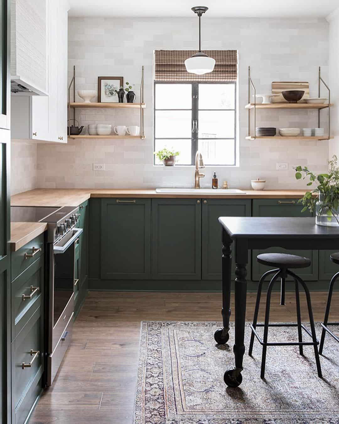 Contrast deep cabinets with minimalist brass bar pulls