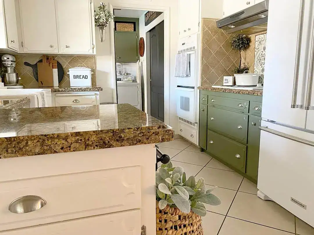 Pair sage green cabinets with a farmhouse sink and subtle hardware