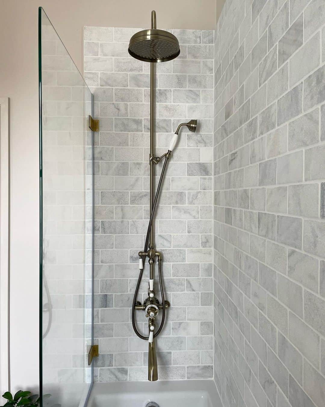 Achieve Classic Brightness with Marble Subway Tile Walls