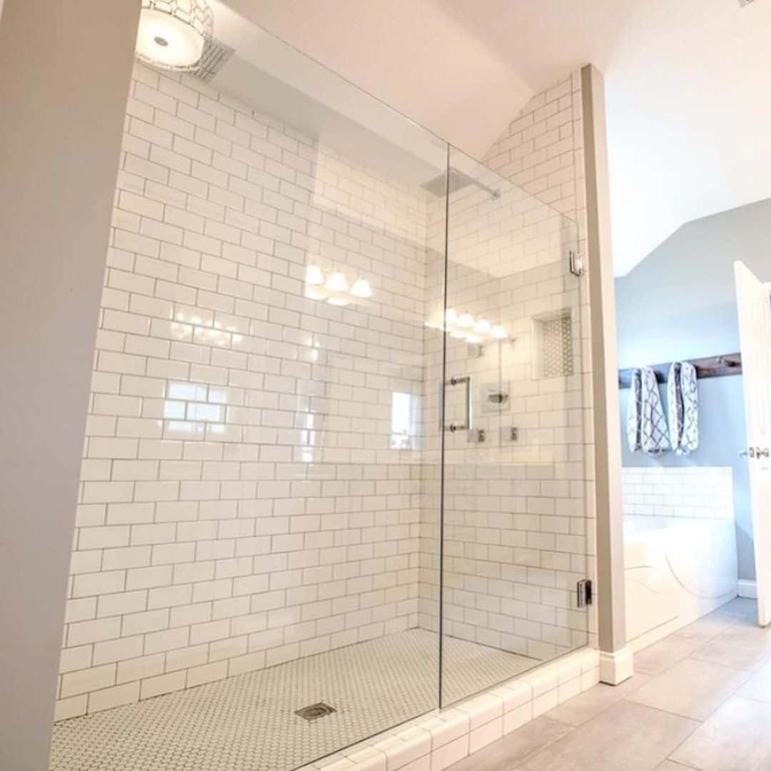 Soften Your Shower Base with White Penny Tile Flooring