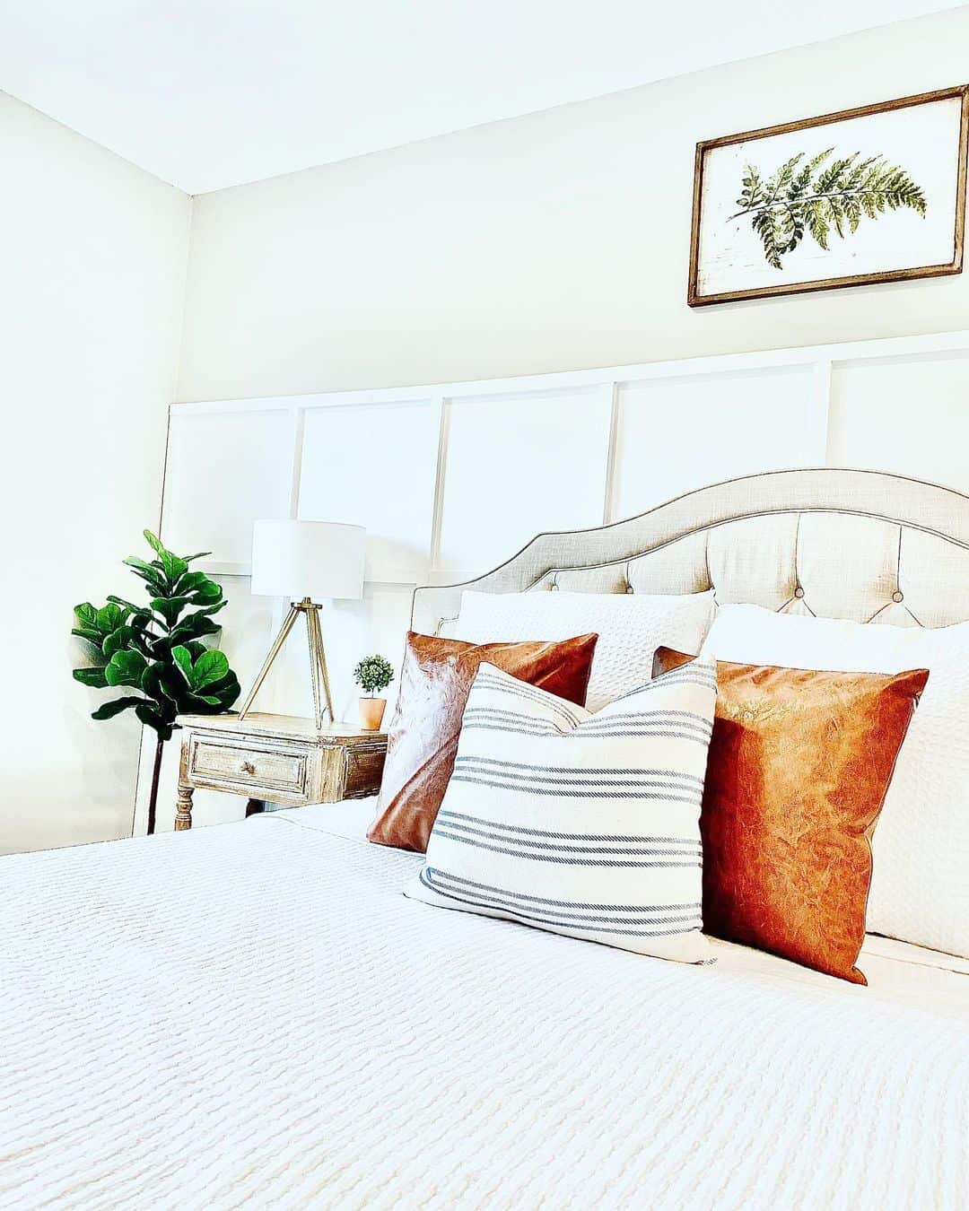 Geometric Panels Add Subtle Dimension Behind the Bed