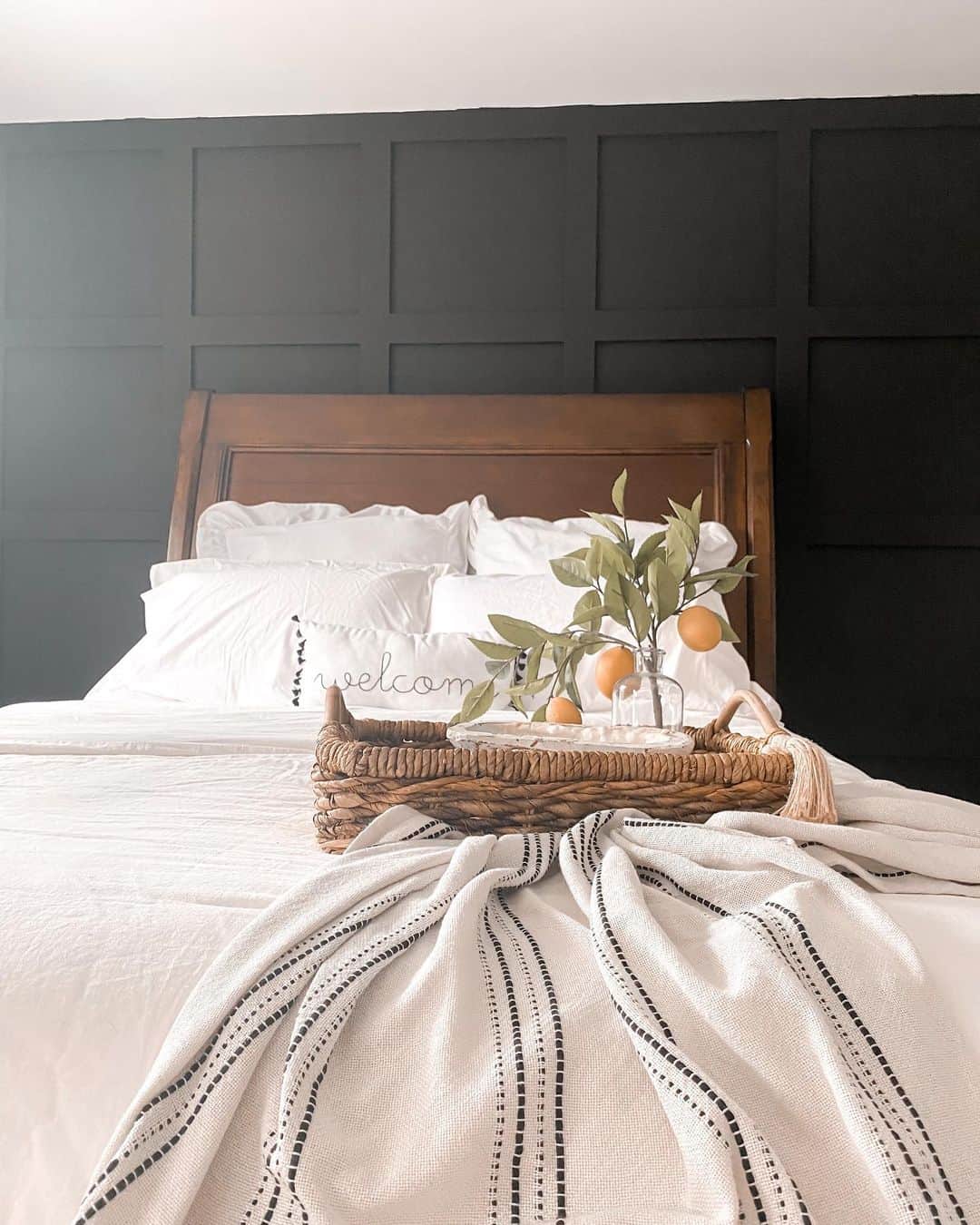 Dark Paneled Wainscoting Creates a Bold Statement Wall