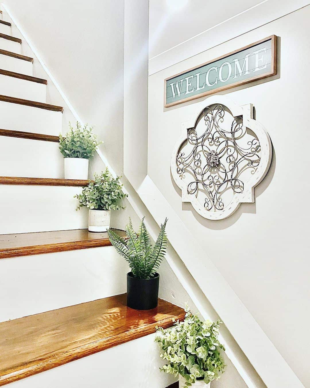 Faux Greenery Adds Life to Stair Risers and Landings