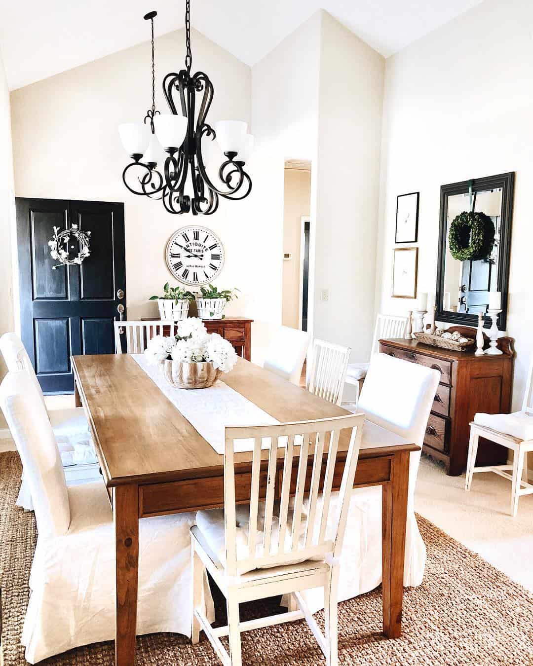White Slipcovered Chairs Soften A Wooden Dining Table