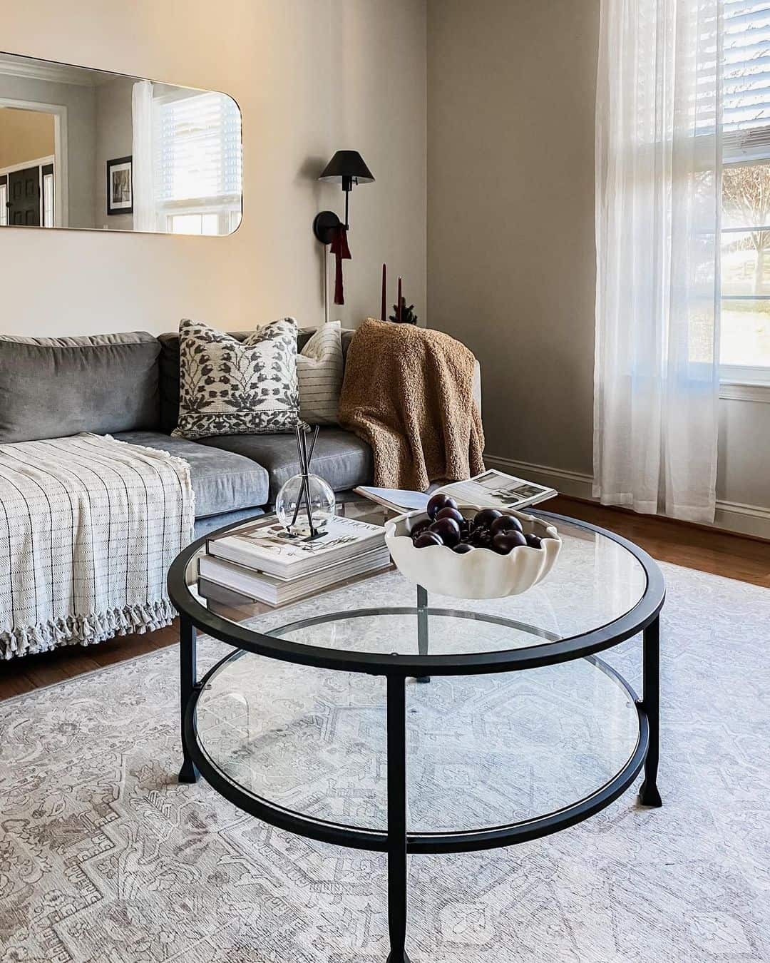 Round Glass Coffee Table with Double Tiered Shelving