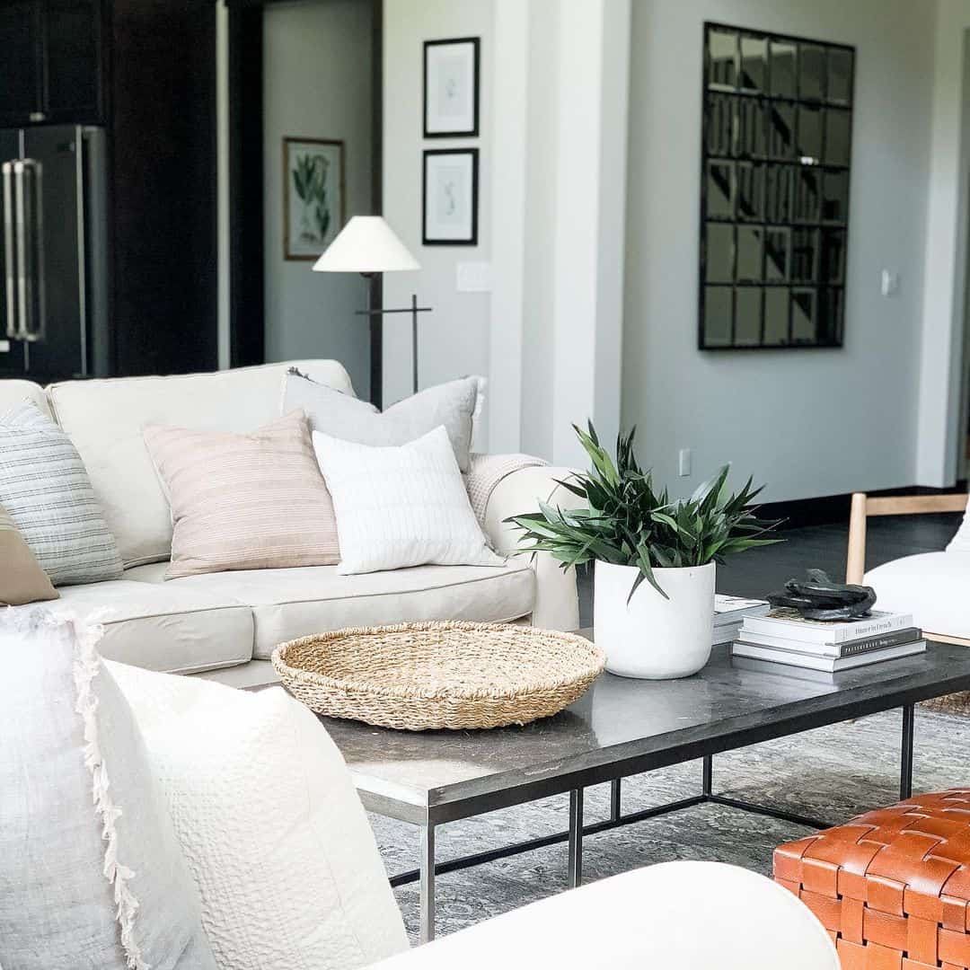 Dark Metal Coffee Table with Woven Bowl and Planter