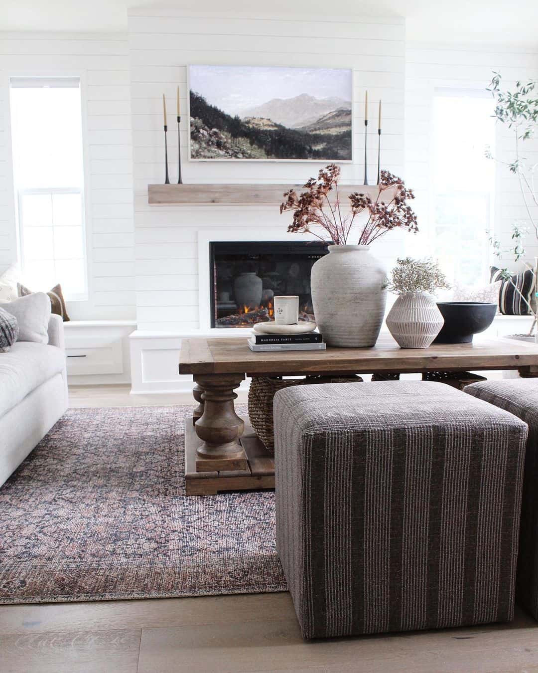 Chunky Turned Legs Support a Rustic Wooden Coffee Table