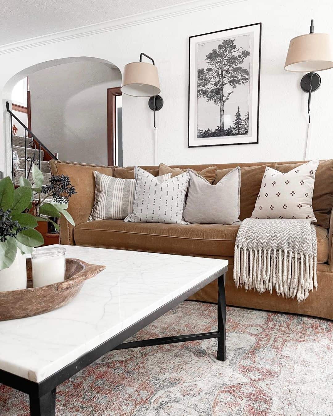 Marble-Top Coffee Table with Angled Black Legs for Modern Contrast