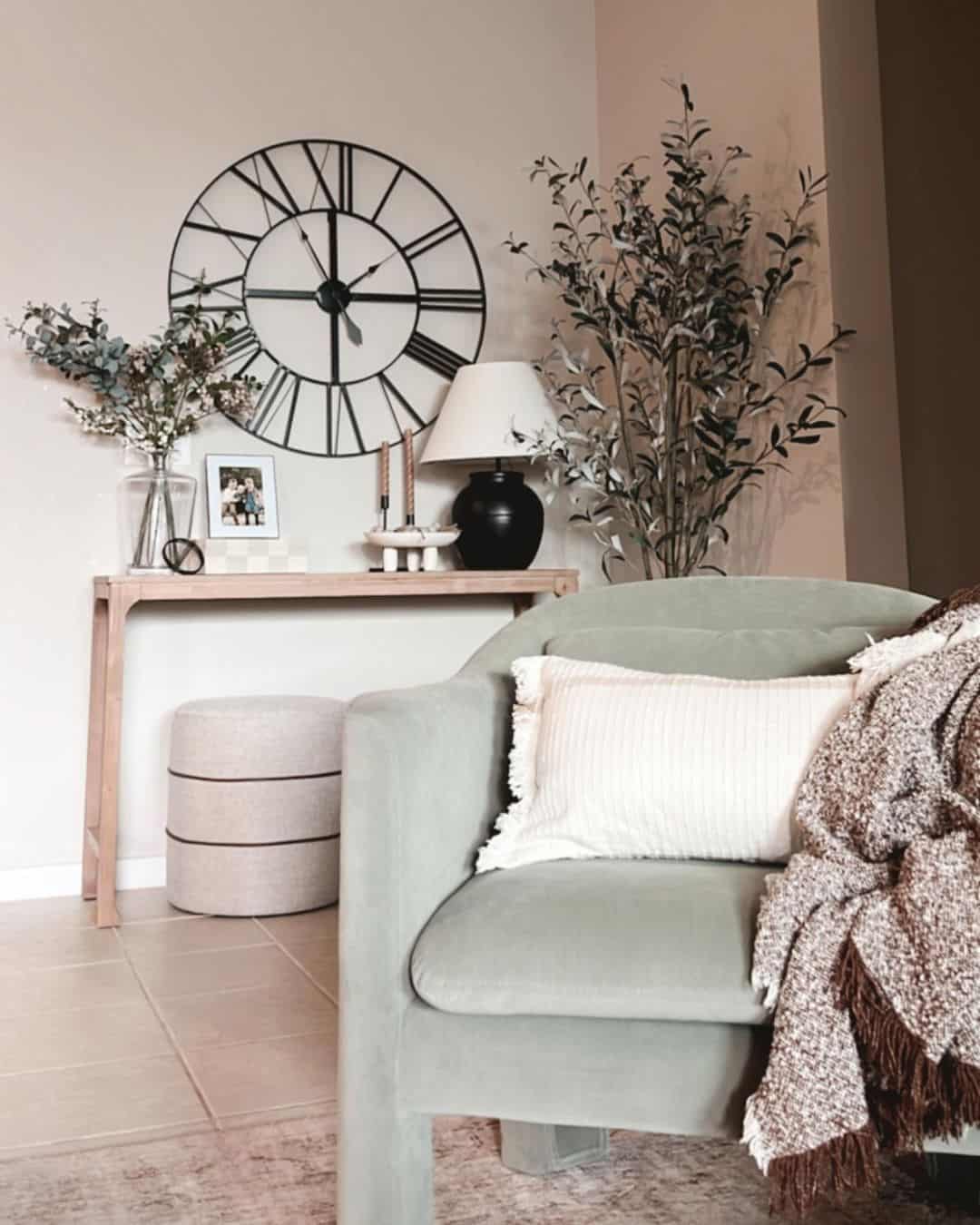 Oversized Roman Numeral Clock Anchors Console Table Display