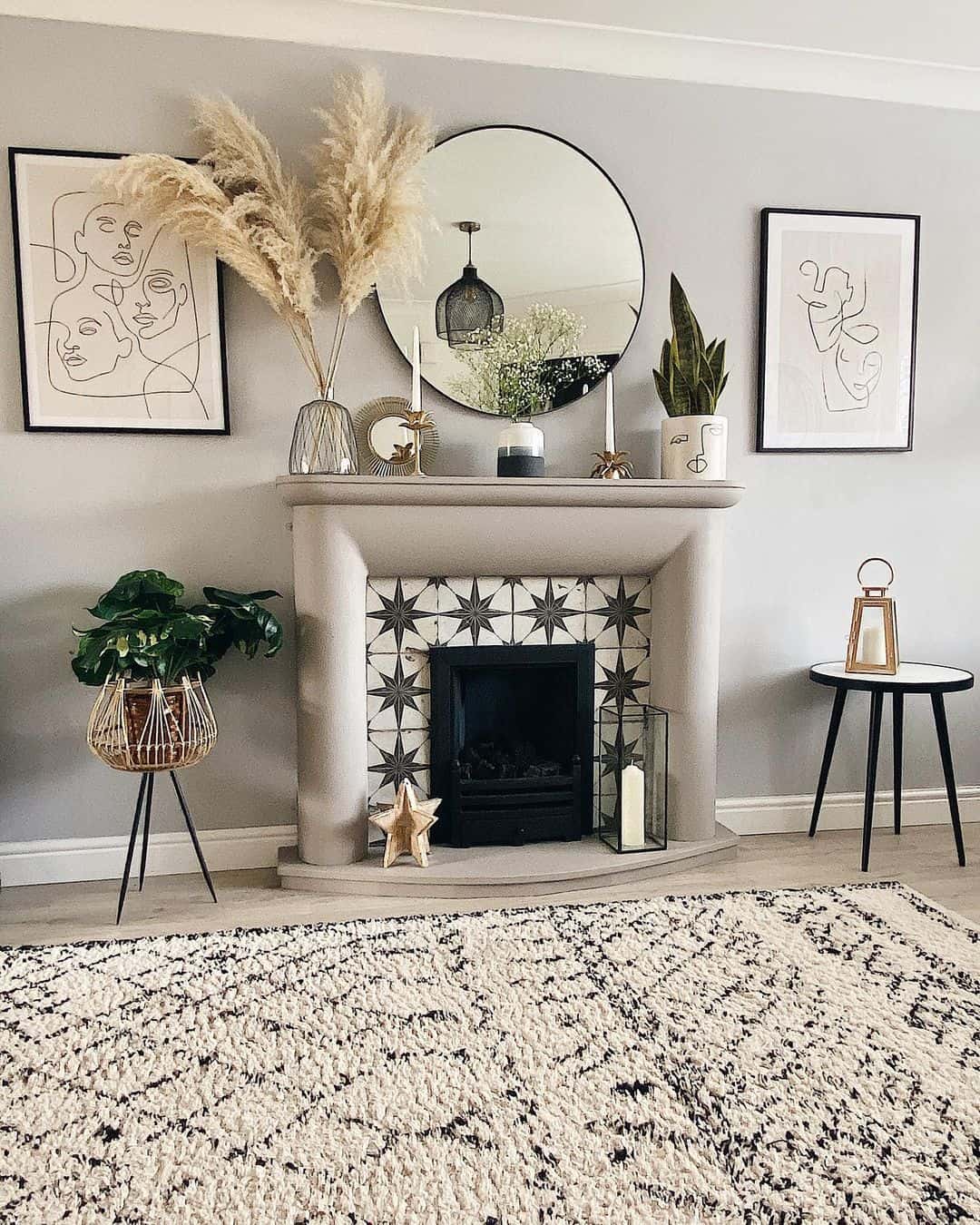 Round Black Mirror Adds Depth Above Your Mantel