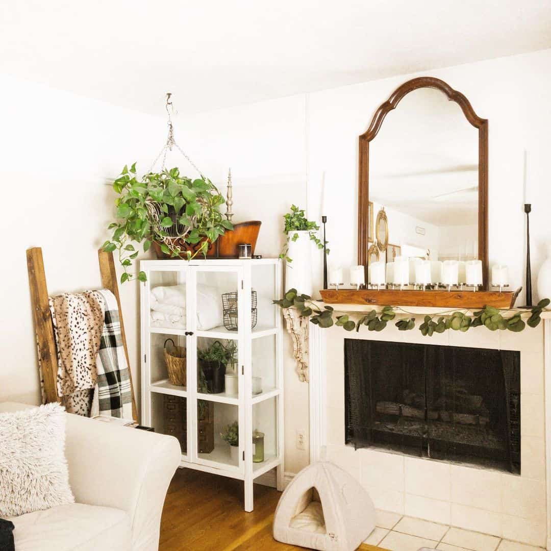 Tall Arched Mirror Frames a Cozy Living Room Fireplace