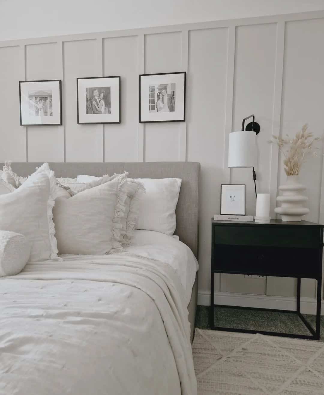 Three Black and White Framed Photos Add Personal Depth Above the Bed