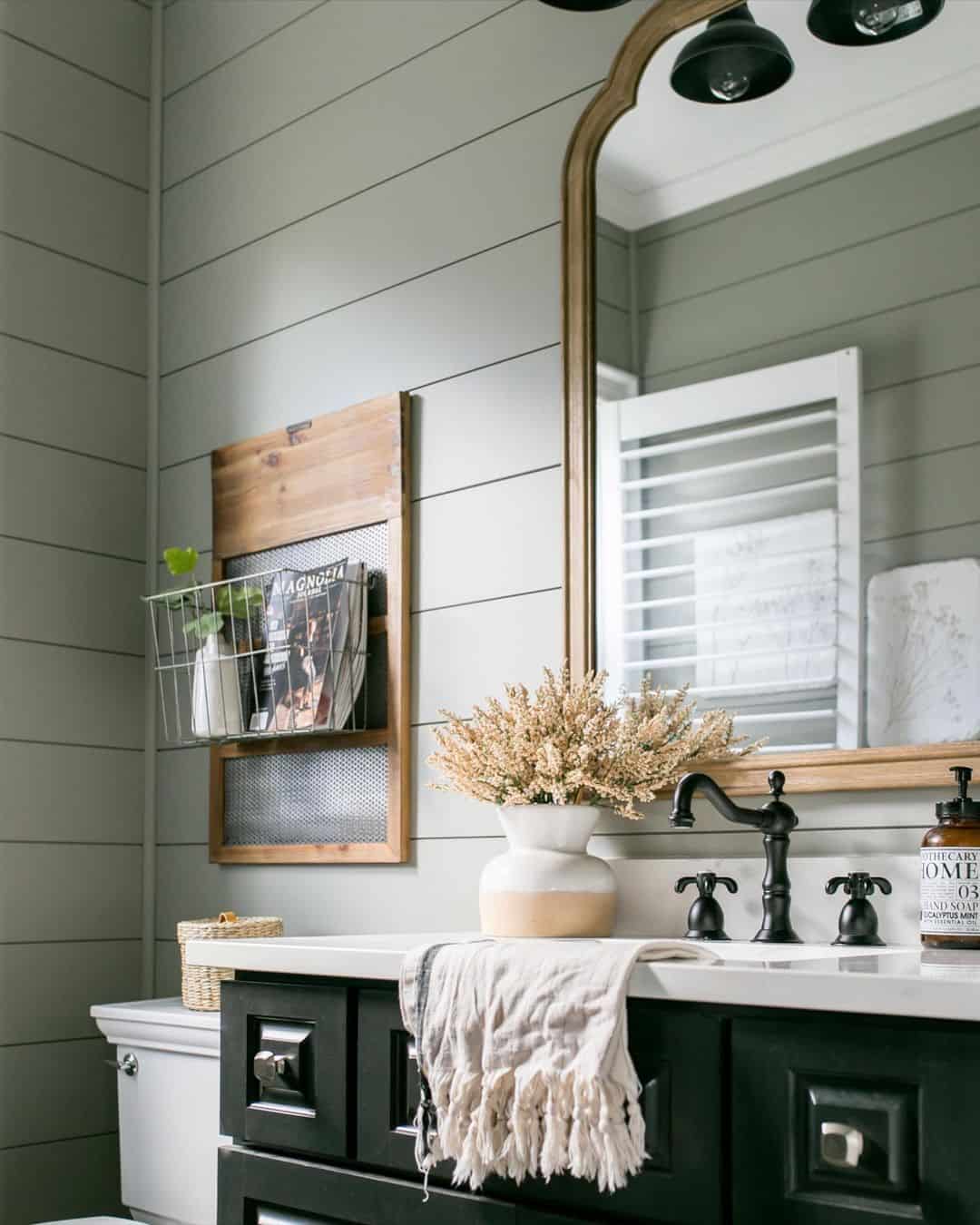 Wire Magazine Rack Adds Rustic Storage Above the Toilet