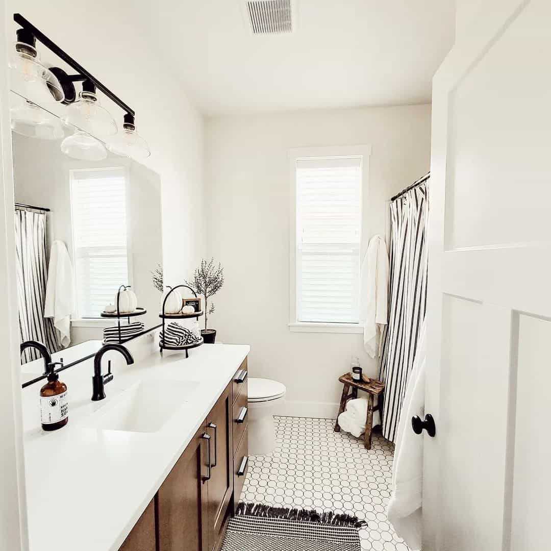 Tiered Black Wire Stand Adds Artful Storage for Towels