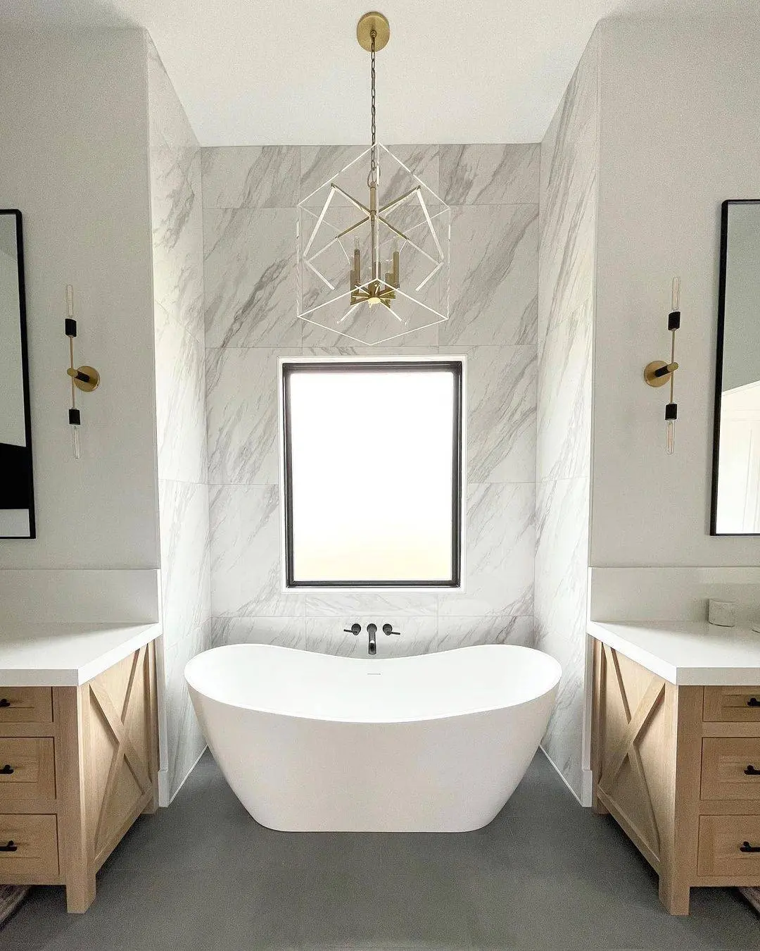 Geometric Chandelier Adds Modern Sculpture Above the Tub