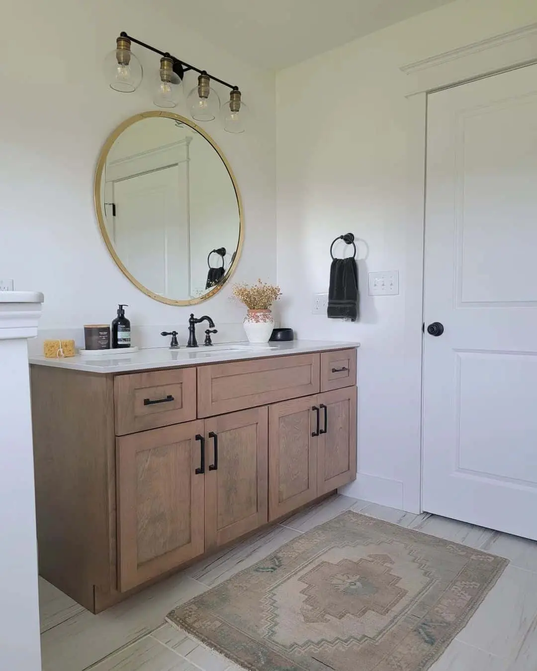 Round Gold Mirror Frames a Simple Vanity for a Clean Look