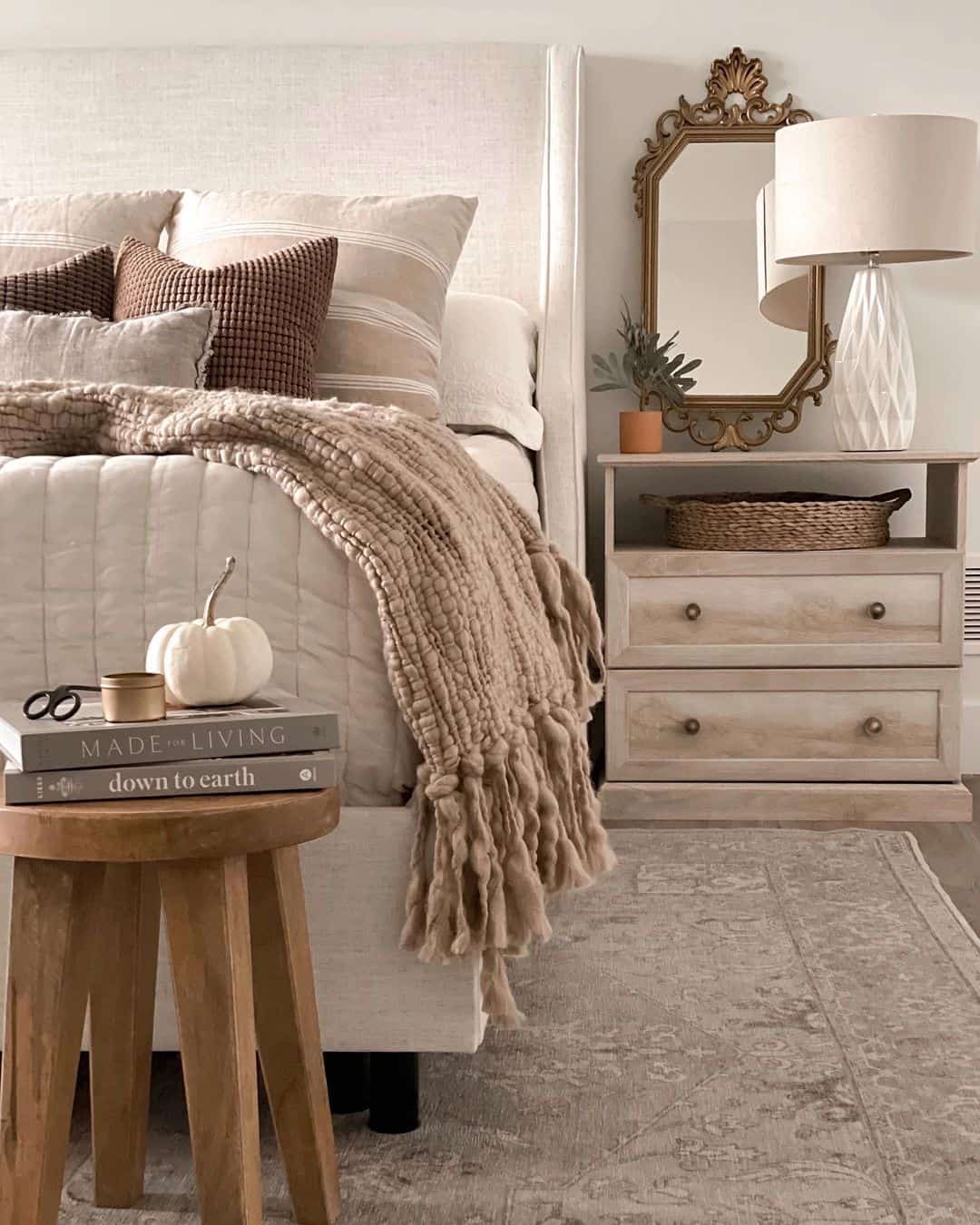 Stacked Books Create A Cozy Bedside Vignette