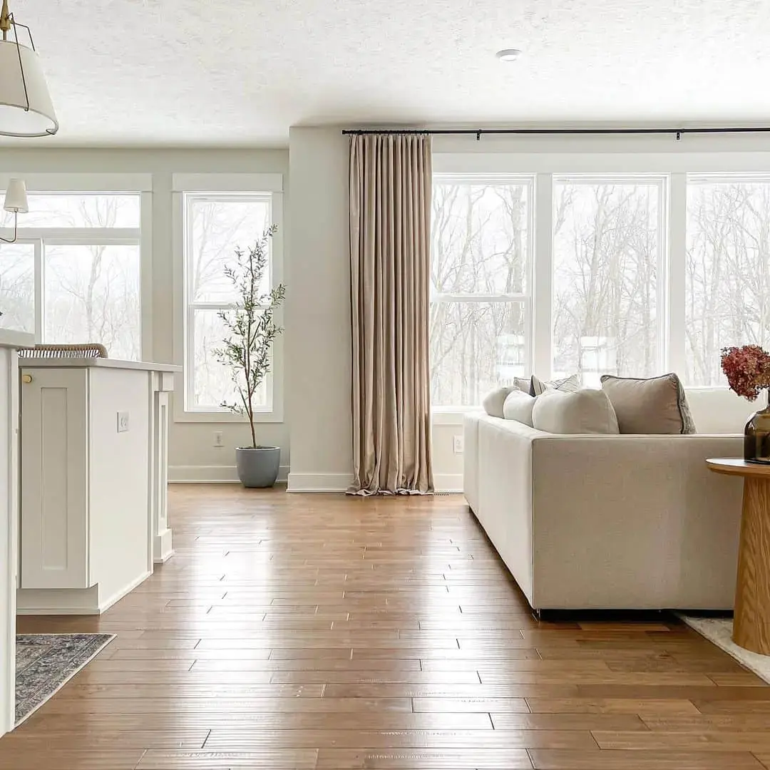 Tall Faux Tree Adds Vertical Interest Near Windows