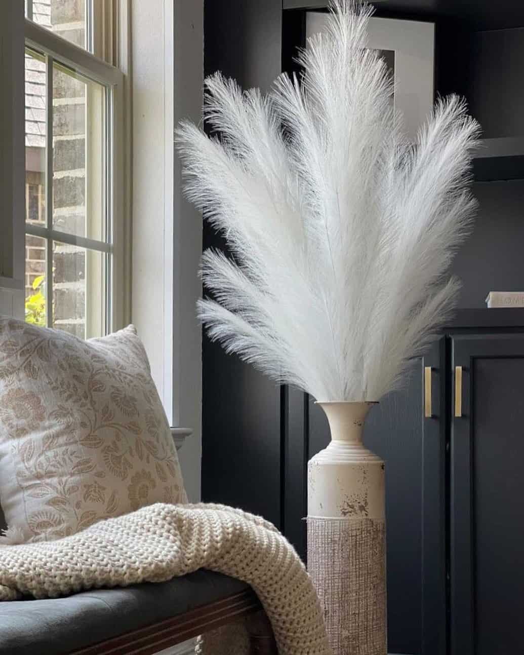 Tall Textured Vase Holds Fluffy White Pampas Grass