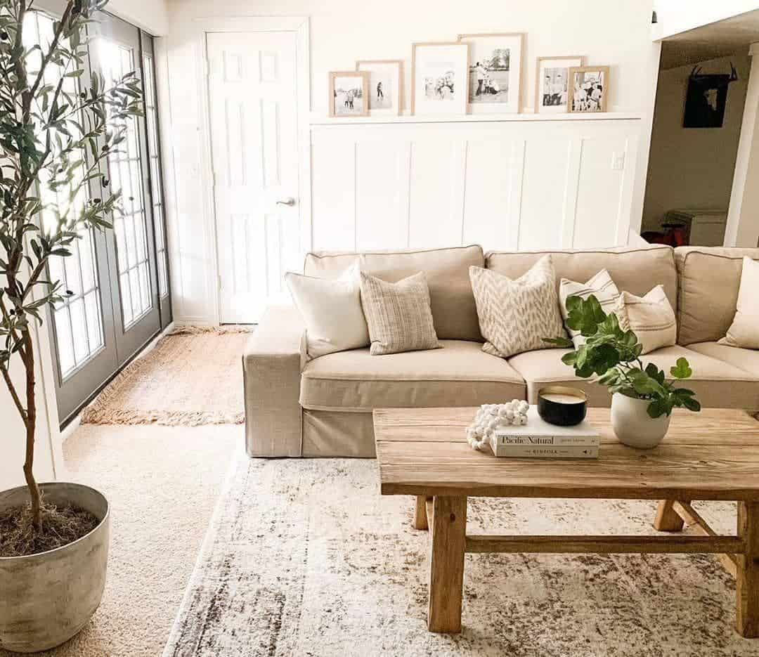 Wooden Coffee Table Displays Books and Greenery