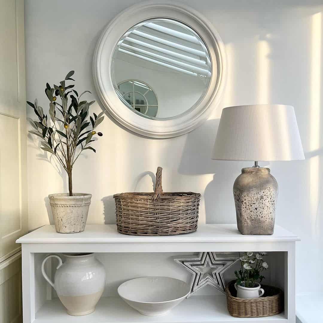 White Round Mirror Reflects Natural Light