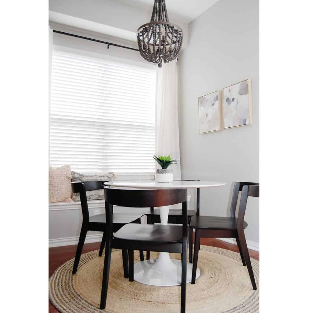 Contrast a White Tulip Table with Dark Wood Chairs