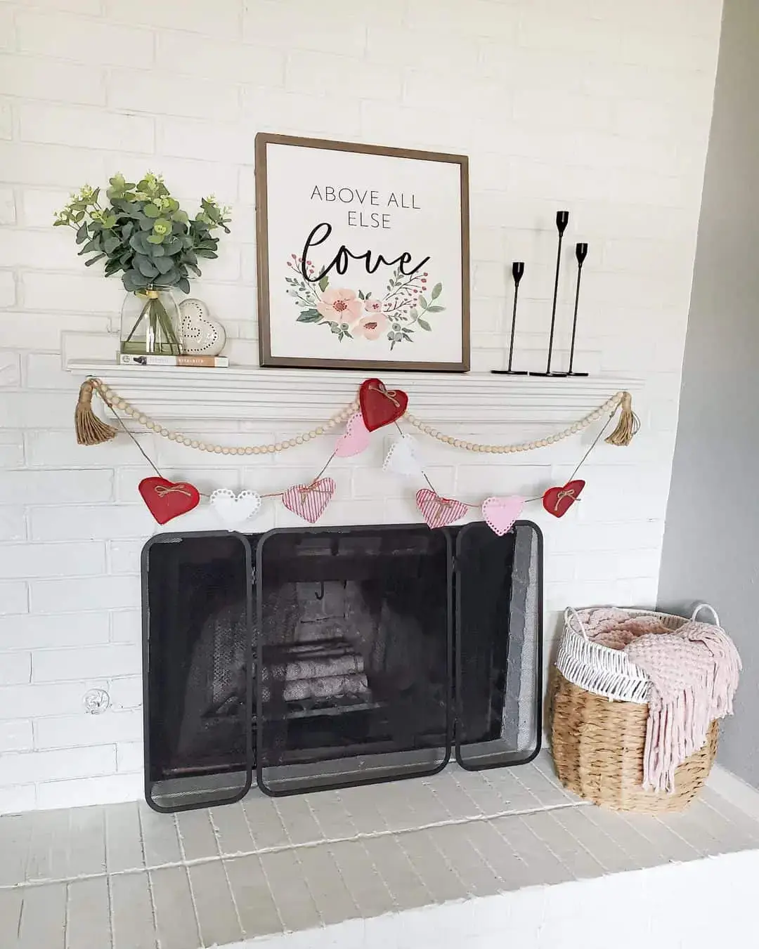 Beaded Garland Frames a Heart Banner Above the Fireplace