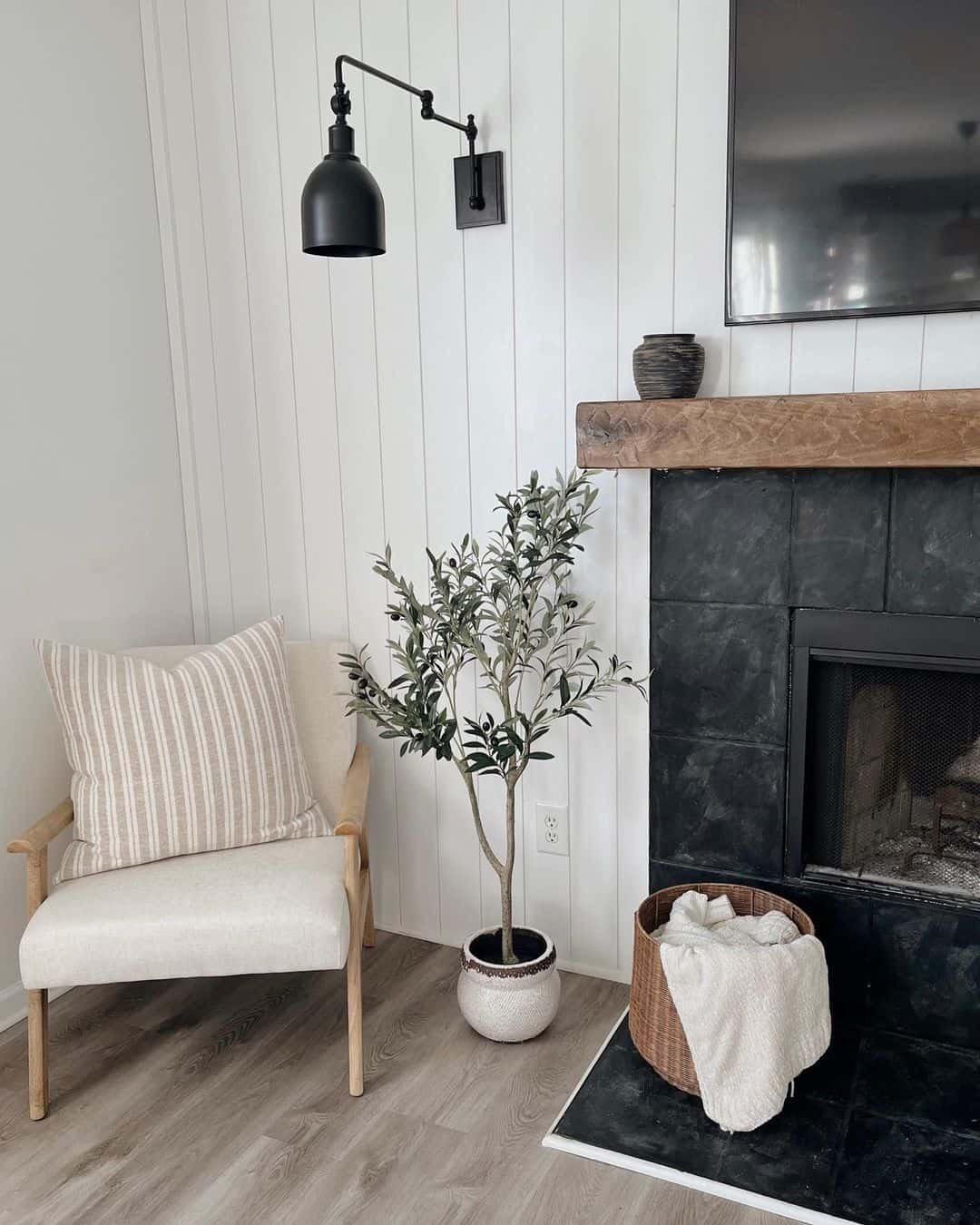 Faux Olive Tree Adds Life to Fireplace Corner