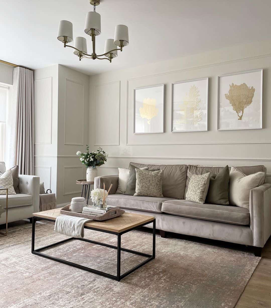 Three framed botanical prints add metallic shimmer to the wall