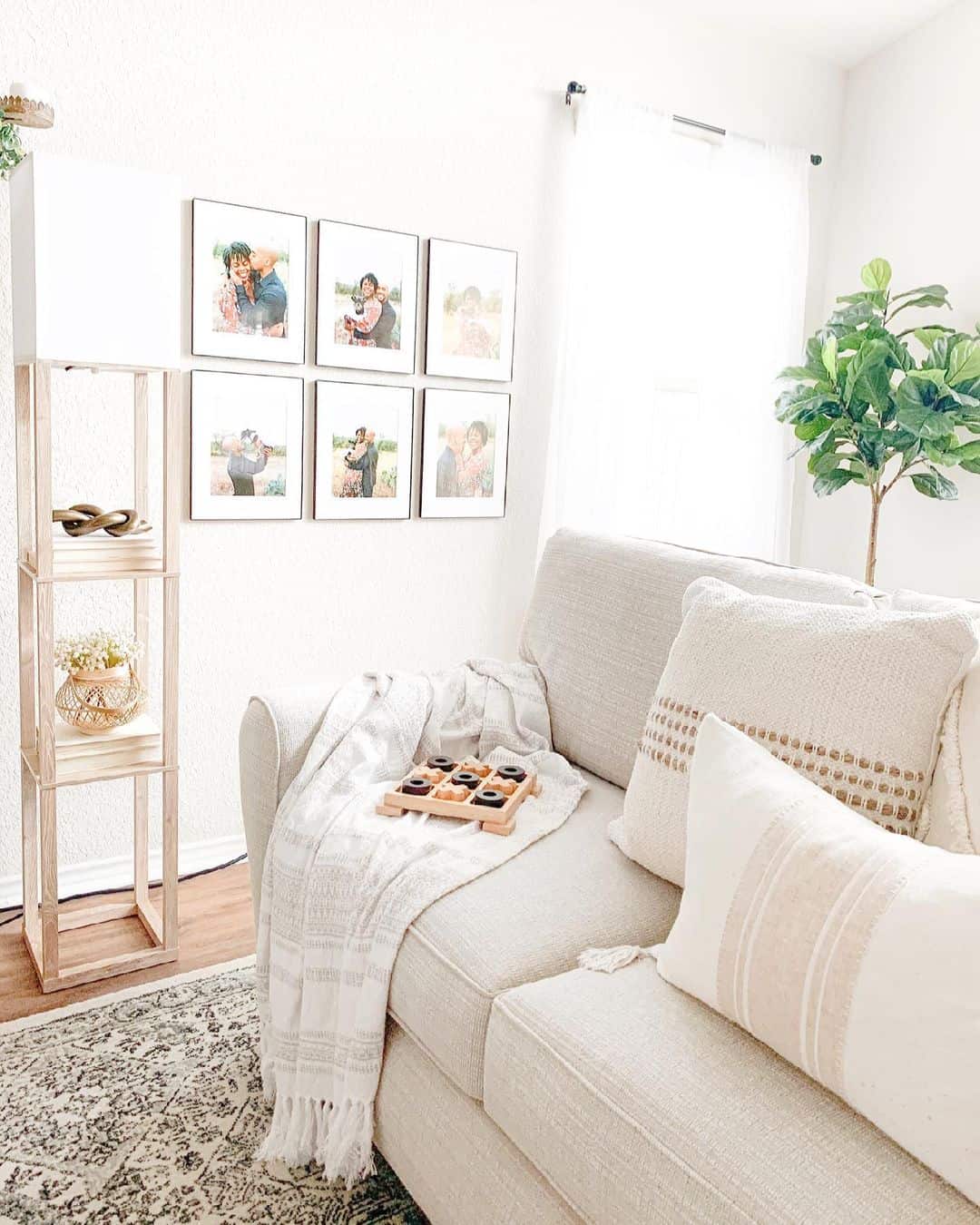 Six framed family photos create a modern gallery wall