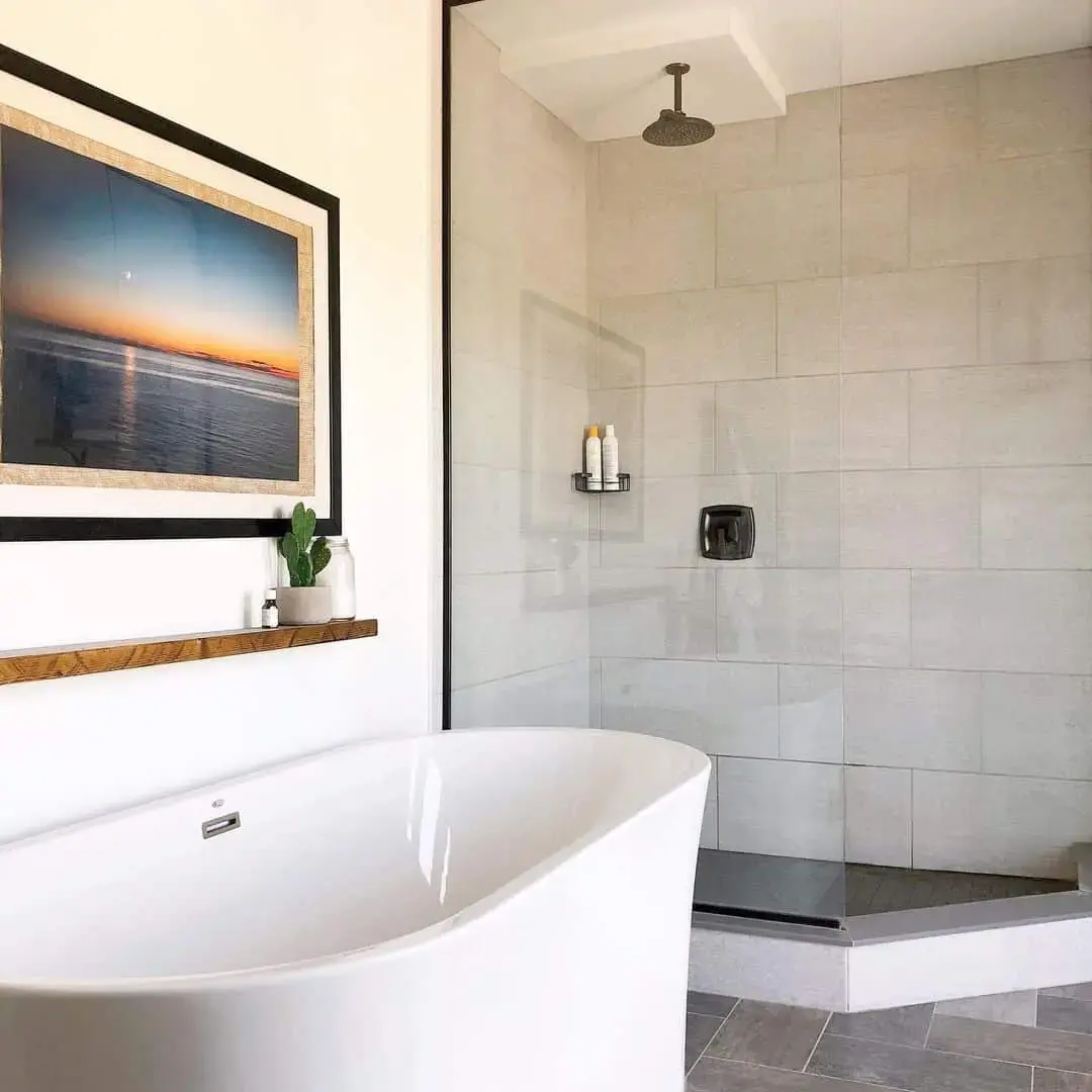 Large Format Gray Tiles Create a Seamless Shower Enclosure