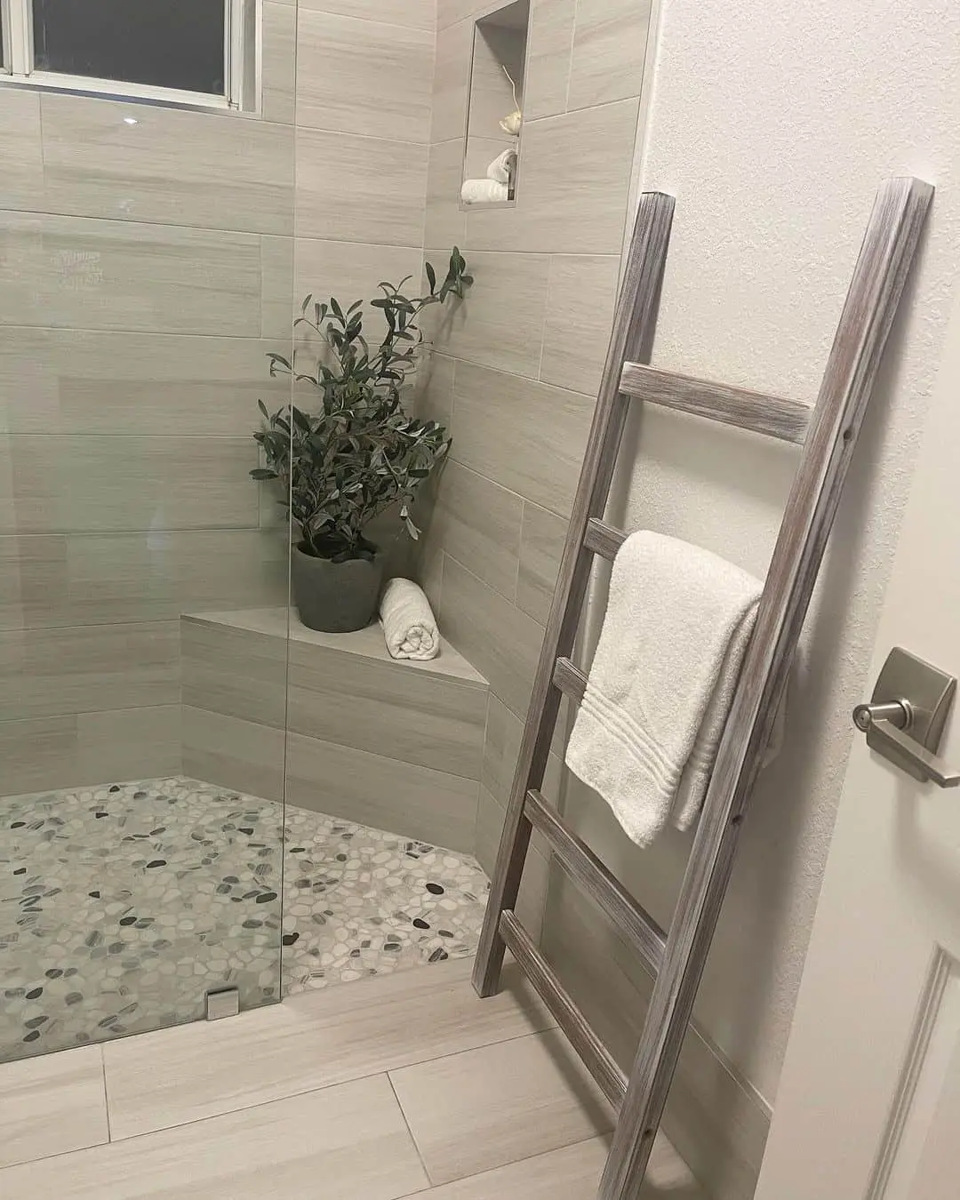 Rustic Ladder Adds Towel Storage Next to Shower