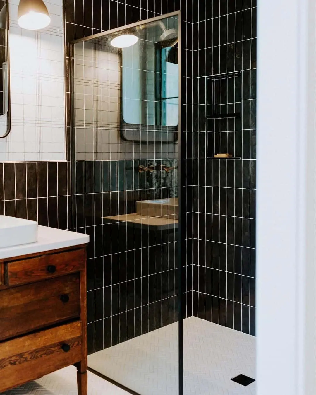 Vertical Black Tile Creates a Dramatic Shower Enclosure
