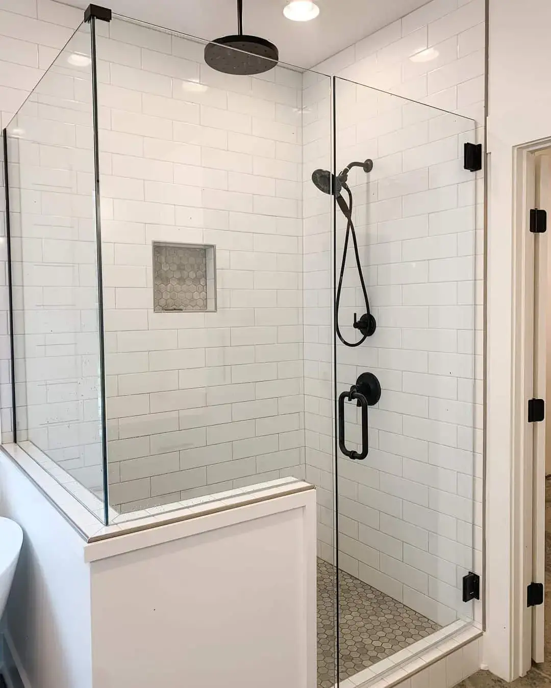 Classic White Subway Tile Walls Meet Hexagon Floor
