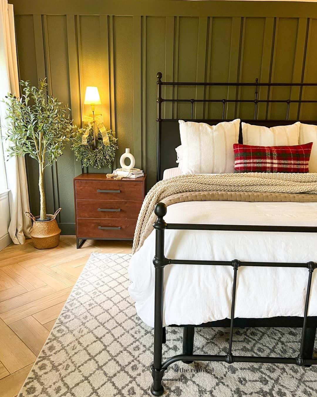 Deep Olive Green Panels Add Depth to a Bedroom